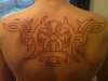 Tribal and cross custom outline tattoo