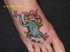 My sister n laws Frog tattoo on foot