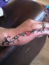 hand tat tattoo