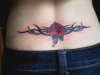 lower back tribal rose tattoo