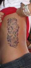 rib tattoo. tattoo
