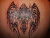 cross wirh wings tattoo