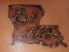 Louisiana Boot On My Left Sholder tattoo