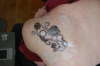 Rose vine tattoo