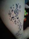 Stars and music notes. tattoo