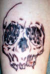 flame skully tattoo
