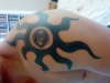 TRIBAL SUN WITH EYE tattoo
