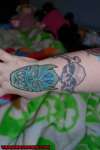 mask and skull wrist tats tattoo