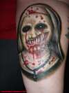 nun doll tattoo