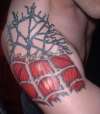 Spiderman Skin Rip with Muscle Fibres tattoo