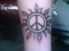 sun-peace tattoo