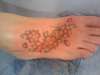 Cherry blossom foot tattoo