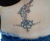 dragon and pentagram tattoo