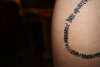 Calf in Swahili tattoo