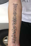 LOVE IS WHY WE LIVE tattoo