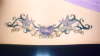 Lower back tattoo