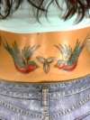 Pretty birds with celtic knot tattoo