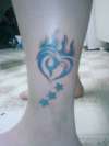 Heart and stars tattoo