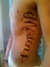 Rib Tat tattoo