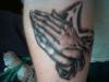 Praying hands tattoo