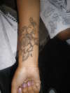 a key with hearts tattoo