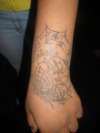 butterfly with spider web n name tattoo