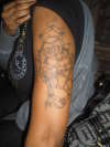 cross with rose and the vines wrappin around cross tattoo