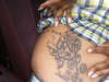BUTTERLY FLOWERS N NAME tattoo