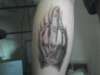 Middle finger on back of my leg tattoo