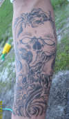 Skulls On Forearm tattoo