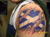 Scottish Flag / Ripped Skin tattoo