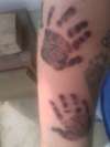 sons handprints tattoo