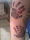 sons handprints tattoo