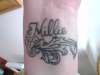 Daughter's name on wrist tattoo