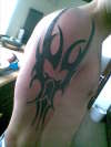 his own design tattoo