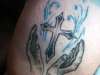 cross and hands tattoo