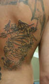 Demon Side Of Back Piece tattoo