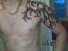 Tribal that I had wrapped over my shoulder to my chest tattoo