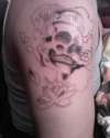 unfinishskull tattoo