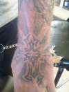 cross and rays tattoo