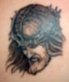 jesus face tattoo