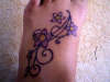 flowers && swirls tattoo