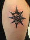 scull impacked tattoo