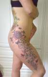 Flower arm and back continuation......outline completed tattoo