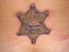 Sheriff Badge tattoo