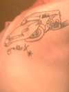 lightning mcqueen with sons name under it, still needs colored tattoo