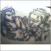 Angels Fighting a Demon tattoo