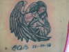 angel with child tattoo
