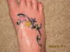 Stars on foot tattoo