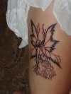 Wifes fairy outline tattoo